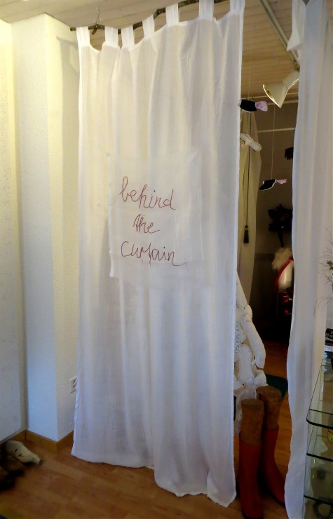 behind the curtain